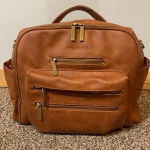 The Honest Co. Leather diaper bag.